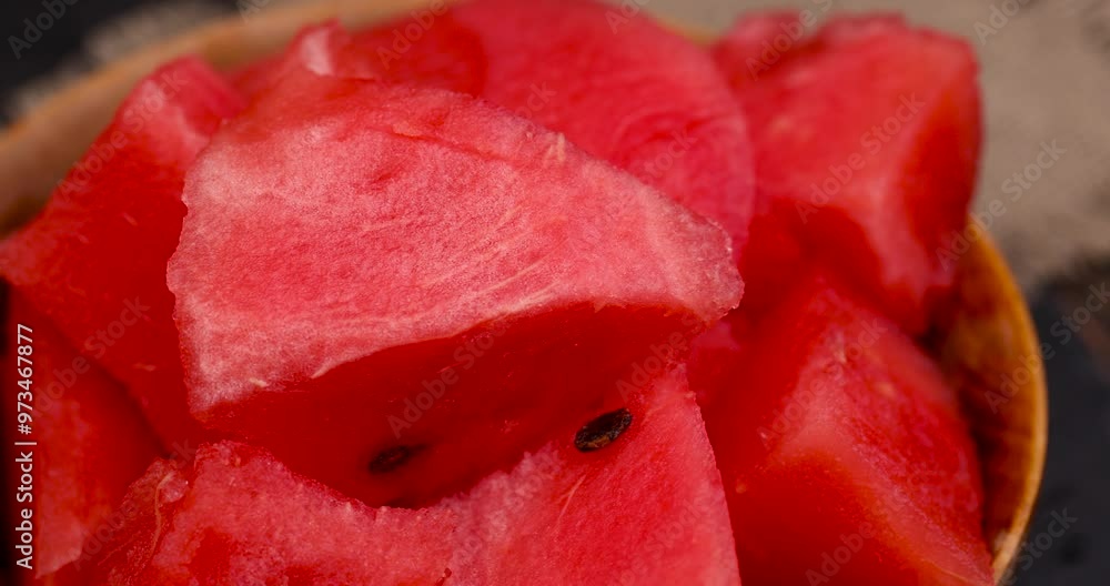 pieces of red watermelon on the table, cooking ripe red watermelon pieces of red watermelon on the table, cooking ripe red watermelon