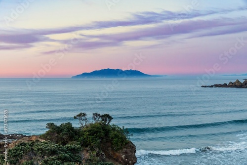 Beach, waves and Little Barrier Island at Tawharanui, Warkworth, Auckland, New Zealand.