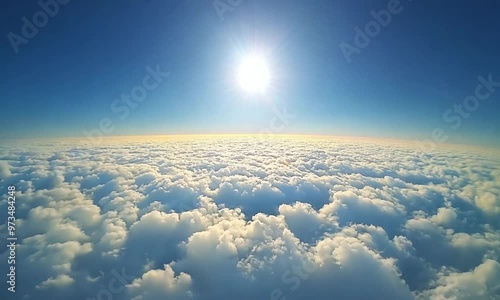 areal shot flying in sky passing through clouds at day time