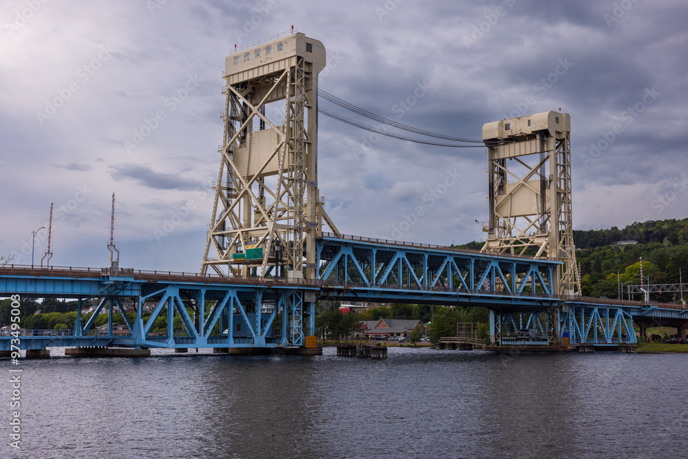 A Double Deck Lift Bridge Crossing A River A Double Deck Lift Bridge Crossing A River