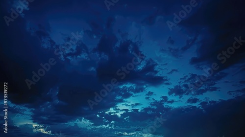 Twilight sunset with dark blue sky and clouds for background with space for text