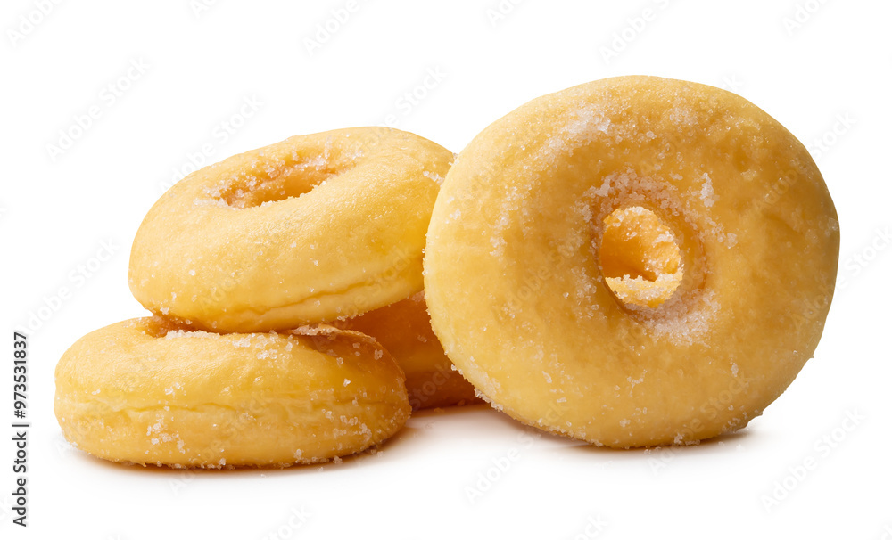 Side view of brown sugar glazed cinnamon donuts in stack isolated on white background with clipping path Side view of brown sugar glazed cinnamon donuts in stack isolated on white background with clipping path