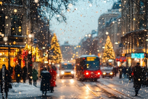 Busy city street with snowfall and Christmas decorations