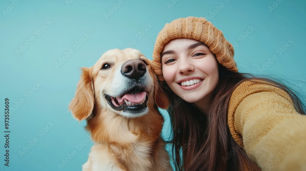 A young woman smiles and leans in close to her golden retriever dog, both looking directly at the camera. A young woman smiles and leans in close to her golden retriever dog, both looking directly at the camera.
