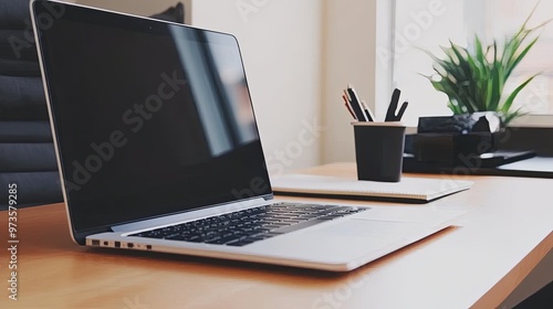 Minimalistic Workspace for Local SEO Strategy: Clean Desk with Laptop, Notepad, and Plant in Natural Light, Perfect for Small Business Optimization and Digital Marketing Plans