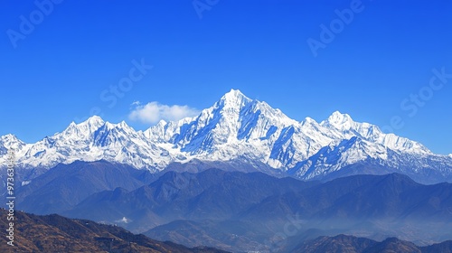 Majestic snow-capped mountain range under clear blue sky, showcasing the breathtaking beauty of towering peaks, pristine wilderness, and serene natural landscape. High resolution, perfect for nature, 