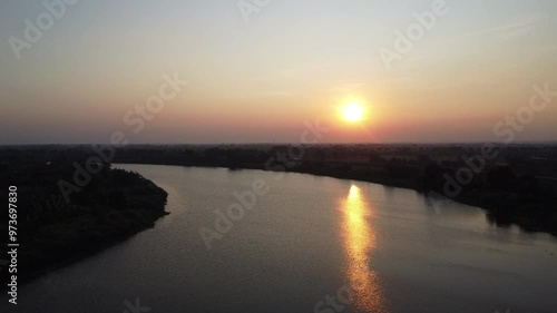 Panoramic aerial video of the Bengawan Solo River at sunset.