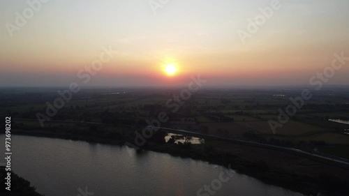 Panoramic aerial video of the Bengawan Solo River at sunset.