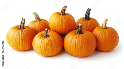 A row of pumpkins with their stems still attached