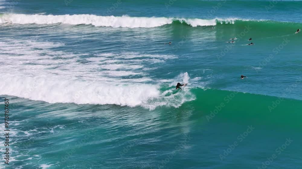 Man surfing waves in Manu Bay, New Zealand in slow motion Man surfing waves in Manu Bay, New Zealand in slow motion