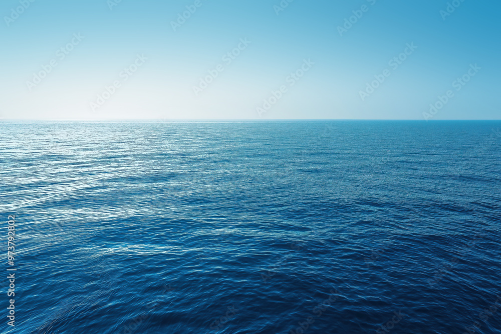 Fototapeta premium Deep blue ocean water surface meeting clear sky horizon