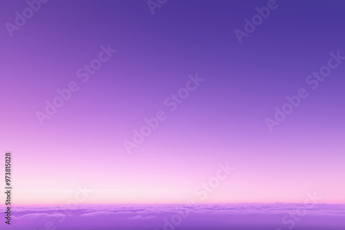 Purple sunset sky gradient changing to pink above clouds