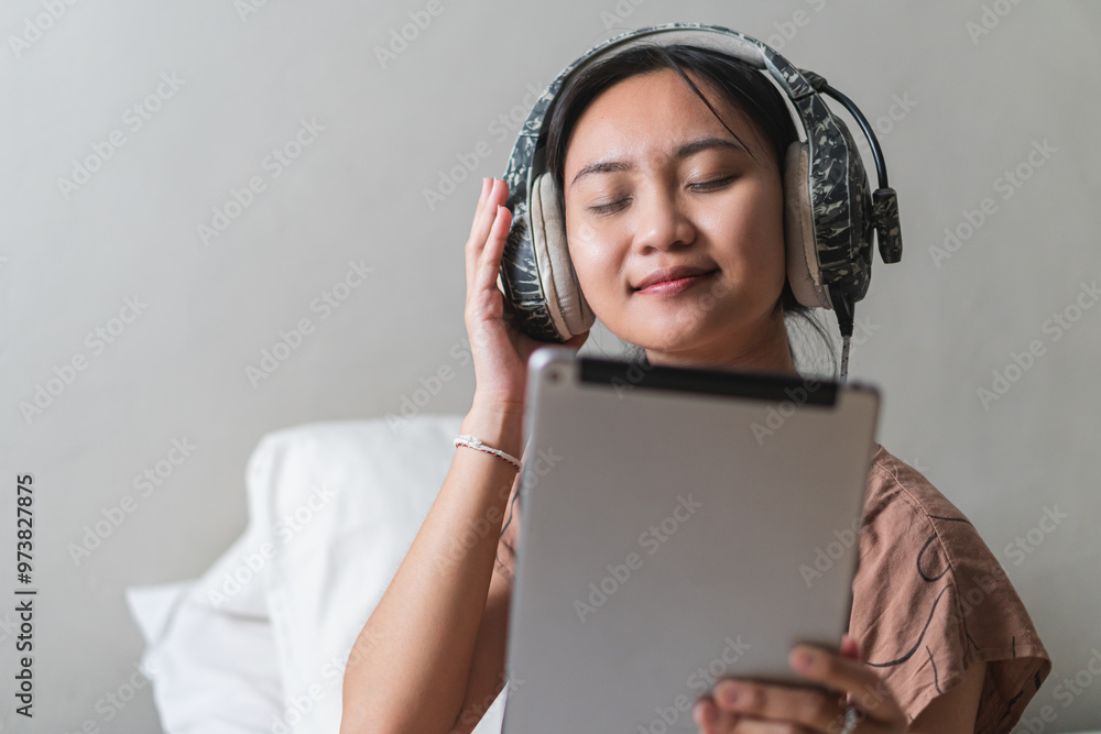 Young Woman Enjoying Music with Headphones Young Woman Enjoying Music with Headphones