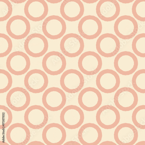 seamless pattern of circles on a beige background