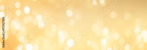 Gentle circles of light float in a golden mist. Modern blurred bokeh background with soft details with bright and brilliant colors.