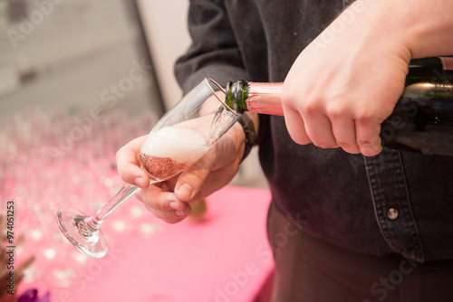 Man pouring a glass of wine photo