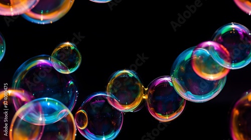 macro photograph of an array of iridescent soap bubbles