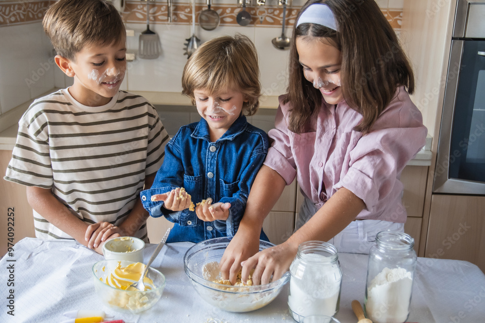 Happy And Smiling Little Chefs Preparing Dough In The Kitchen Happy And Smiling Little Chefs Preparing Dough In The Kitchen