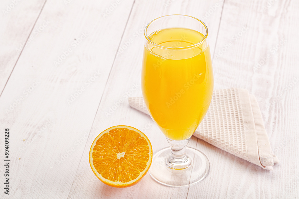 Fototapeta premium Sweet fresh orange juice in the glass