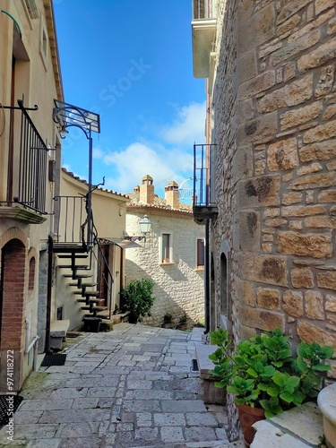 narrow street in the village photo