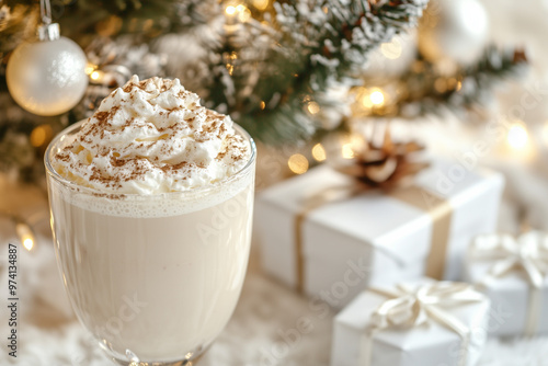 Creamy eggnog with whipped cream, Christmas gifts, and decor