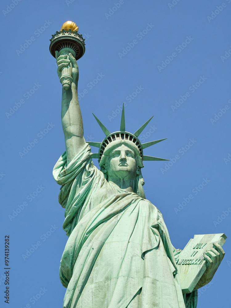 Fototapeta premium The Statue of Liberty Enlightening the World. Usa National Monument. Recognized as a universal symbol of freedom and democracy. National Park Service.
