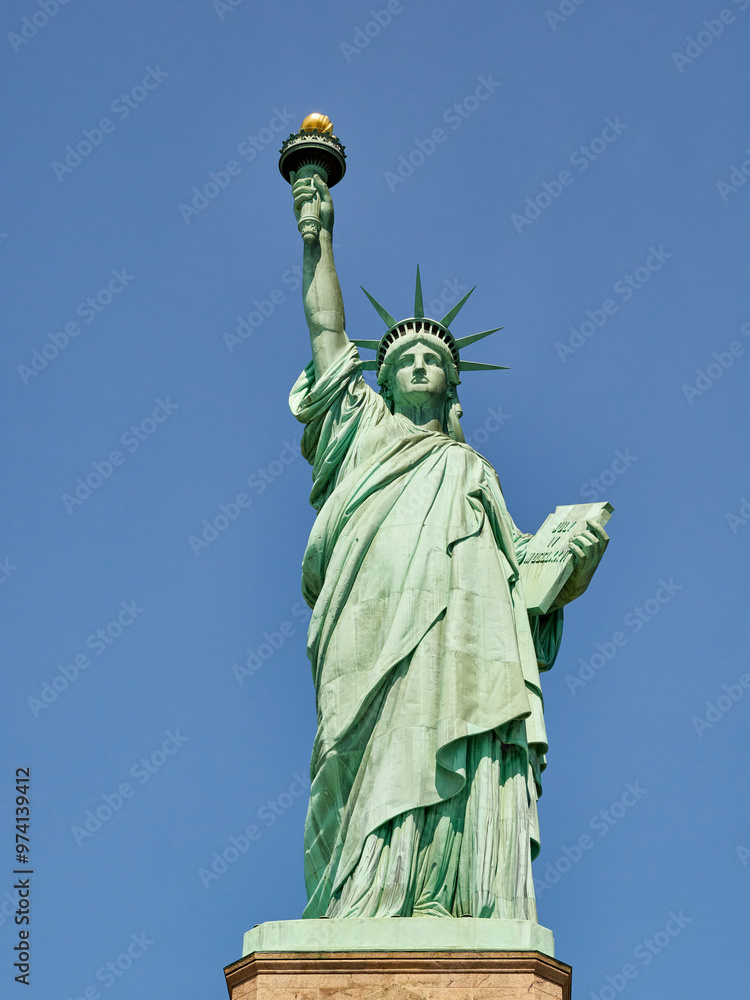 Fototapeta premium The Statue of Liberty Enlightening the World. Usa National Monument. Recognized as a universal symbol of freedom and democracy. National Park Service.