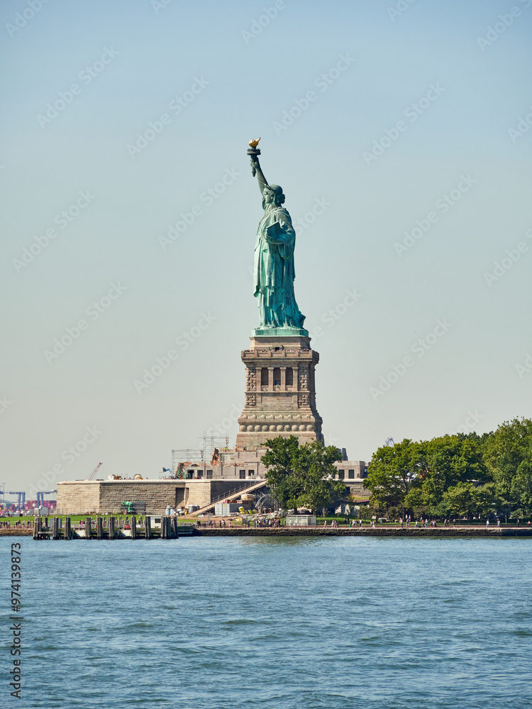Fototapeta premium The Statue of Liberty Enlightening the World. Usa National Monument. Recognized as a universal symbol of freedom and democracy. National Park Service.