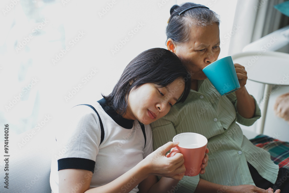 Asian woman at home with her mother
Asian woman at home with her mother