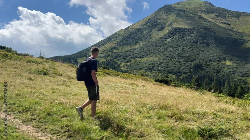 Hiker Walks into Beautiful Carpathian Mountain Landscapes Hiker Walks into Beautiful Carpathian Mountain Landscapes