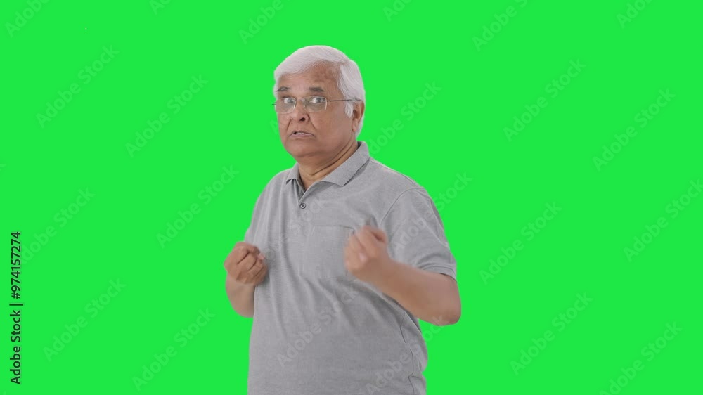Angry Indian old man fighting with someone Green screen Angry Indian old man fighting with someone Green screen