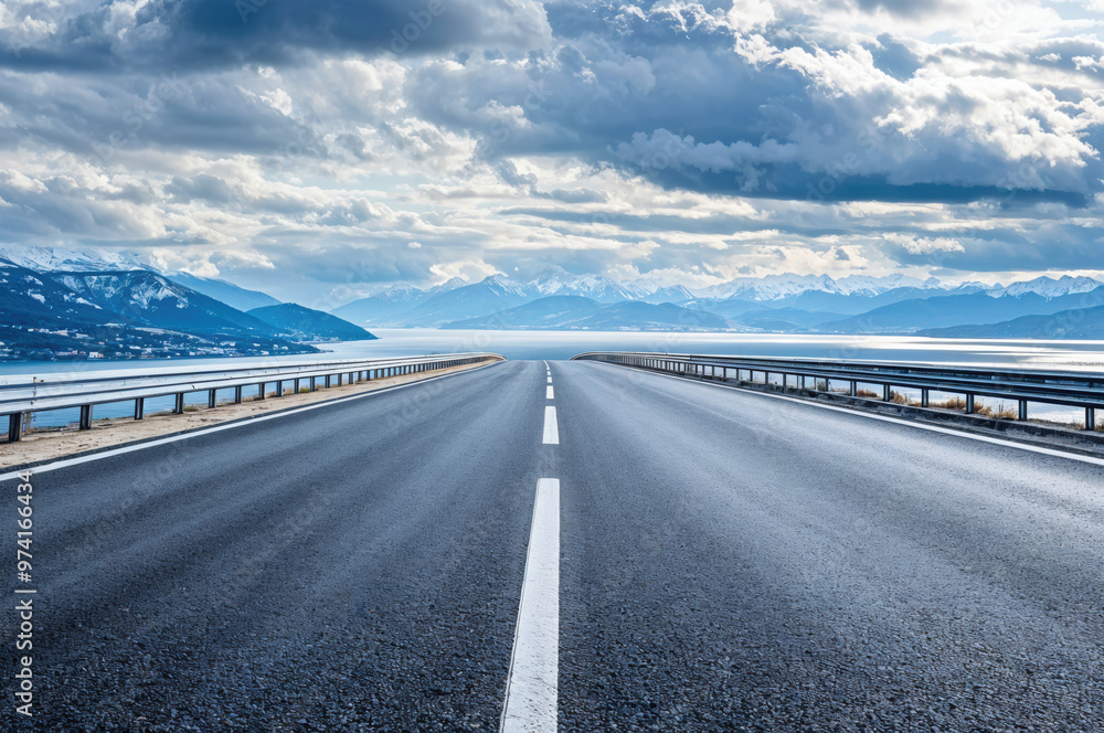 Fototapeta premium Empty asphalt highway leading to mountains landscape