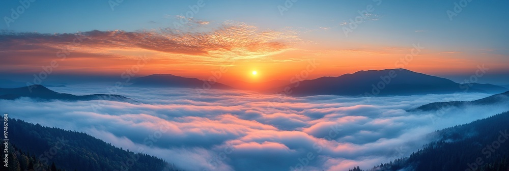 Stunning sunrise over a sea of clouds in a mountain range. Stunning sunrise over a sea of clouds in a mountain range.