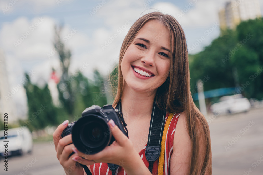Photo of lovely positive adorable girl wear trendy clothes photographing capturing taking photos outdoors Photo of lovely positive adorable girl wear trendy clothes photographing capturing taking photos outdoors