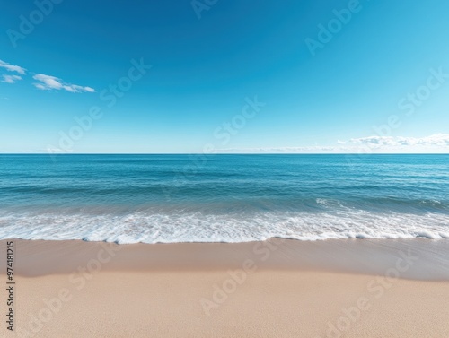 An empty beach scene with a calm sea and open sky offers a serene natural backdrop. 