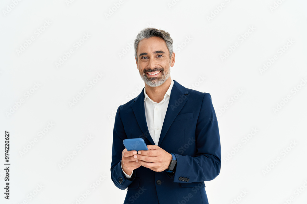 Smiling business man of middle age wearing suit using phone isolated on white background. Happy mature businessman in his 40s with smartphone in hands looking at camera advertising mobile services. Smiling business man of middle age wearing suit using phone isolated on white background. Happy mature businessman in his 40s with smartphone in hands looking at camera advertising mobile services.