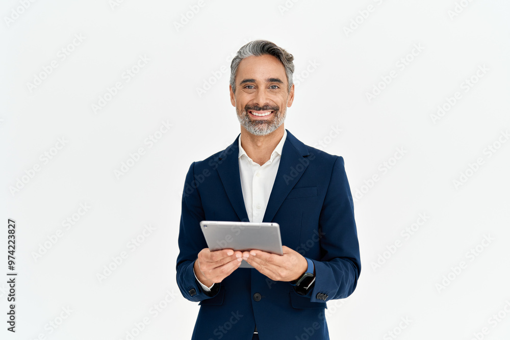 Portrait of happy older middle aged business man executive wearing suit holding tab. Smiling mature businessman leader standing isolated on white background, looking at camera, using digital tablet. Portrait of happy older middle aged business man executive wearing suit holding tab. Smiling mature businessman leader standing isolated on white background, looking at camera, using digital tablet.