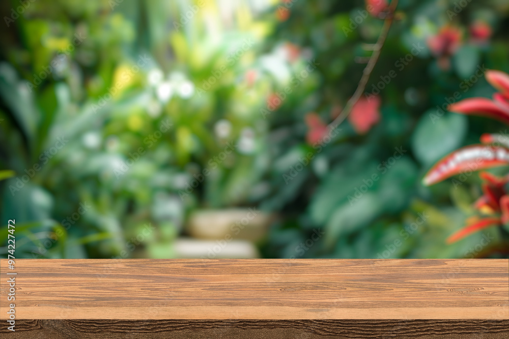Empty wood table top with blur background of tropical jungle in summer green. The table giving copy space for placing advertising product on the table along with beautiful forest banner background. Empty wood table top with blur background of tropical jungle in summer green. The table giving copy space for placing advertising product on the table along with beautiful forest banner background.