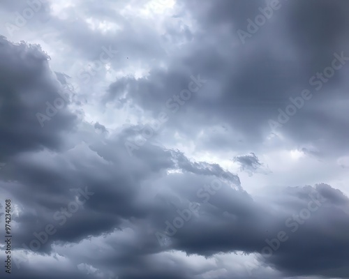 Dramatic overcast sky showcasing various shades of gray clouds, perfect for backgrounds and weather-themed projects.