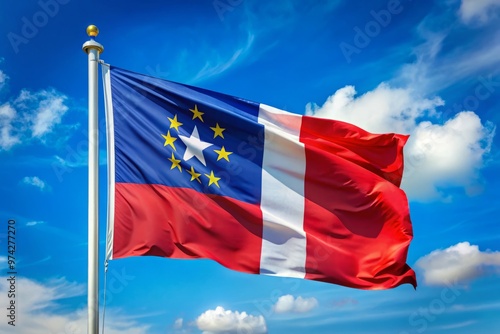 Vibrant colorful state flag waving in the wind against a clear blue sky, symbolizing patriotism and national pride photo