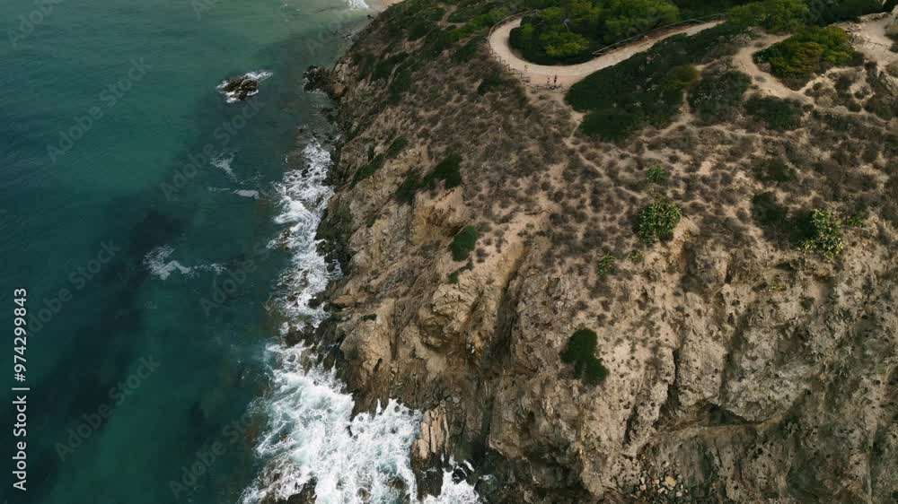 Aerial dolly of rugged coastline in Chia, Sardinia, Italy. Incredible waves and clear water. Beautiful scenery. 4K Drone Video. Aerial Shot. Aerial dolly of rugged coastline in Chia, Sardinia, Italy. Incredible waves and clear water. Beautiful scenery. 4K Drone Video. Aerial Shot.
