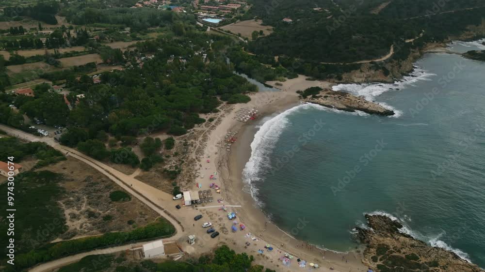 Aerial reveal dolly in Chia, Sardinia, Italy with view of Su Portu Beach. Cloudy day, beautiful seascape. 4K Drone Video. Aerial Shot. Aerial reveal dolly in Chia, Sardinia, Italy with view of Su Portu Beach. Cloudy day, beautiful seascape. 4K Drone Video. Aerial Shot.