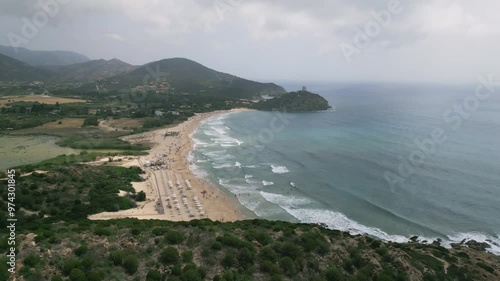 Wallpaper Mural Aerial dolly in Chia, Sardinia, Italy with view of Sa Colonia Beach. Cloudy day, beautiful seascape. 4K Drone Video. Aerial Shot. Torontodigital.ca