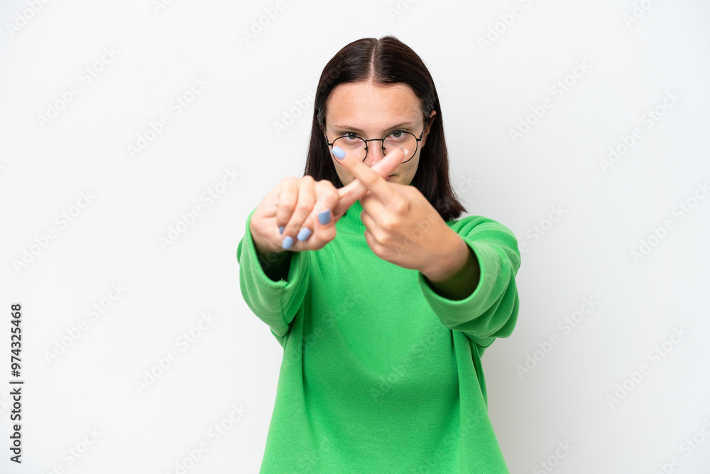 Young caucasian woman isolated on white background making stop gesture with her hand to stop an act Young caucasian woman isolated on white background making stop gesture with her hand to stop an act