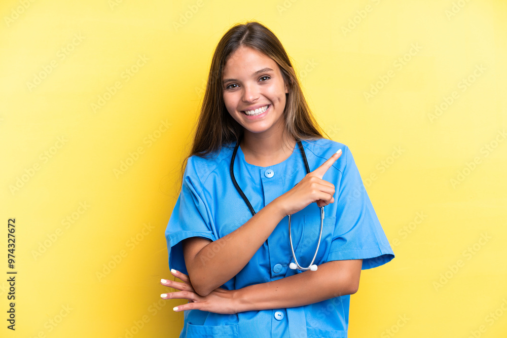 Young nurse caucasian woman isolated on yellow background pointing to the side to present a product Young nurse caucasian woman isolated on yellow background pointing to the side to present a product