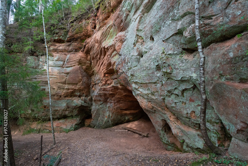 The Licu–Langu cliffs are a sandstone cliff approximately 1 kilometer long and 30 meters high. It is located on the bank of the Gauja river.

Around 20 springs can be seen at the foot of the cliff, wh photo