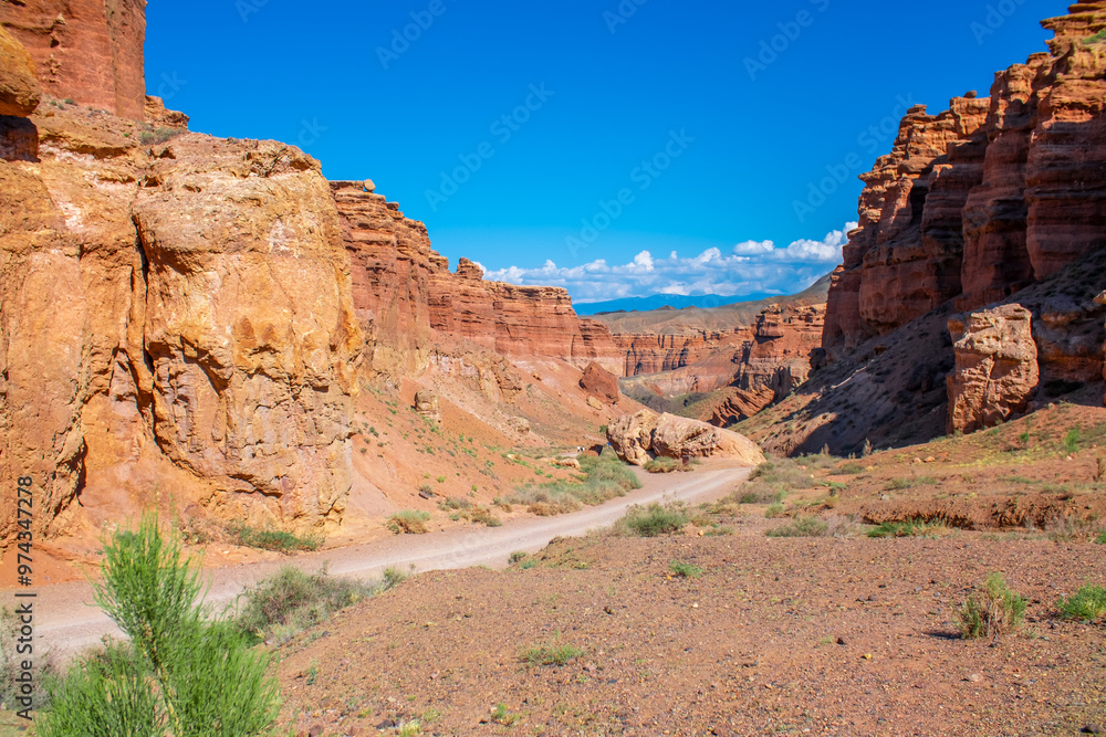 Charyn Canyon, Valley of Castles. The excellence of Kazakhstan. Panorama of natural unusual landscape. The red canyon of extraordinary beauty looks like a Martian landscape. Charyn Canyon, Valley of Castles. The excellence of Kazakhstan. Panorama of natural unusual landscape. The red canyon of extraordinary beauty looks like a Martian landscape.