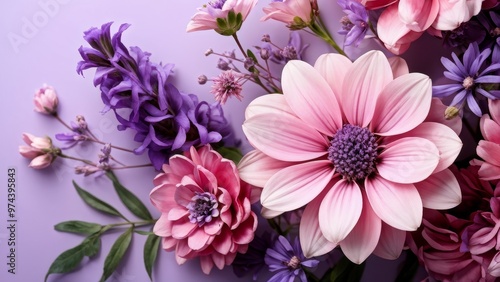 An image of a composition of pink and purple flowers on a pastel background.