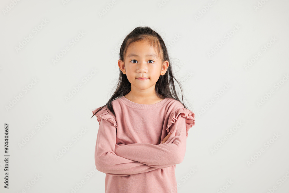 Asian happy portrait cute young kid girl smiling confidence with arms crossed studio shot isolated on white background and copy space, kindergarten children person lifestyle arm folded Asian happy portrait cute young kid girl smiling confidence with arms crossed studio shot isolated on white background and copy space, kindergarten children person lifestyle arm folded