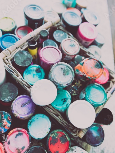 Colorful paints on the floow in an arrangement photo